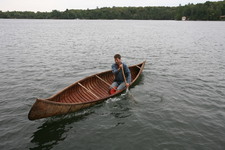 RGB soloing a birch bark canoe